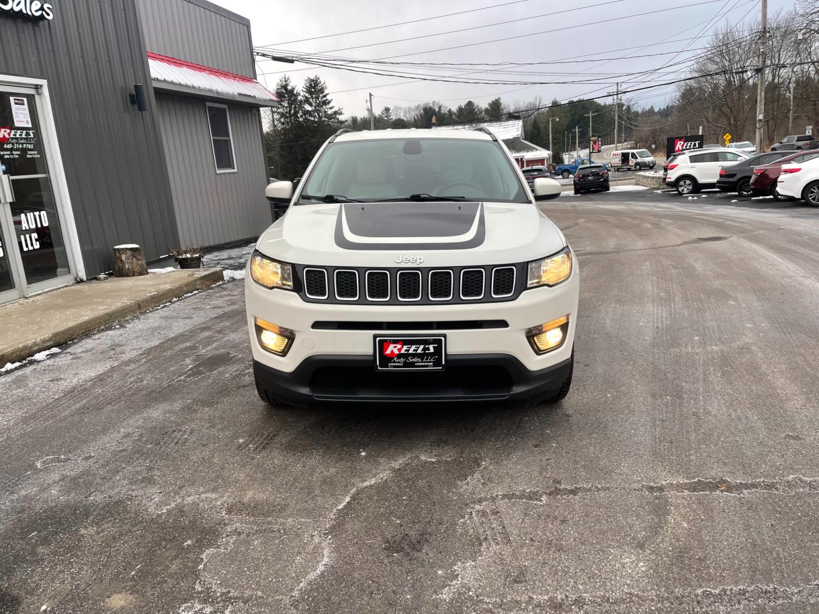 2018 White /White Jeep Compass Latitude 4WD (3C4NJDBB3JT) with an 2.4L I4 DOHC 16V engine, 9 Speed Automatic transmission, located at 11115 Chardon Rd. , Chardon, OH, 44024, (440) 214-9705, 41.580246, -81.241943 - This 2018 Jeep Compass Latitude 4WD with a 2.4-liter engine and 9-speed automatic transmission offers a blend of utility and comfort with its heated leather seats and dual-zone automatic climate control. The 8.4-inch touchscreen provides user-friendly access to navigation, Apple CarPlay, and Android - Photo #1